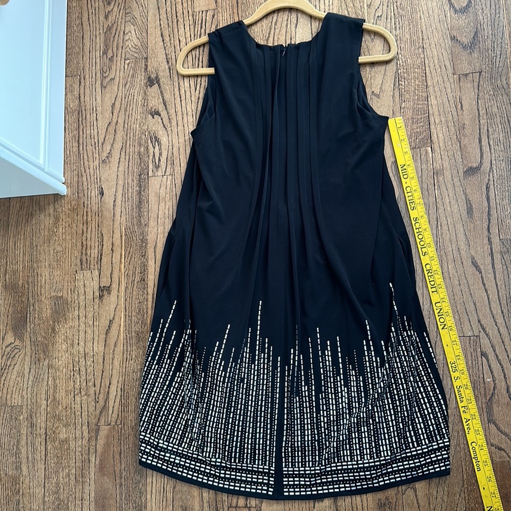 Calvin Klein cocktail dress with silver metallic beads at the hem